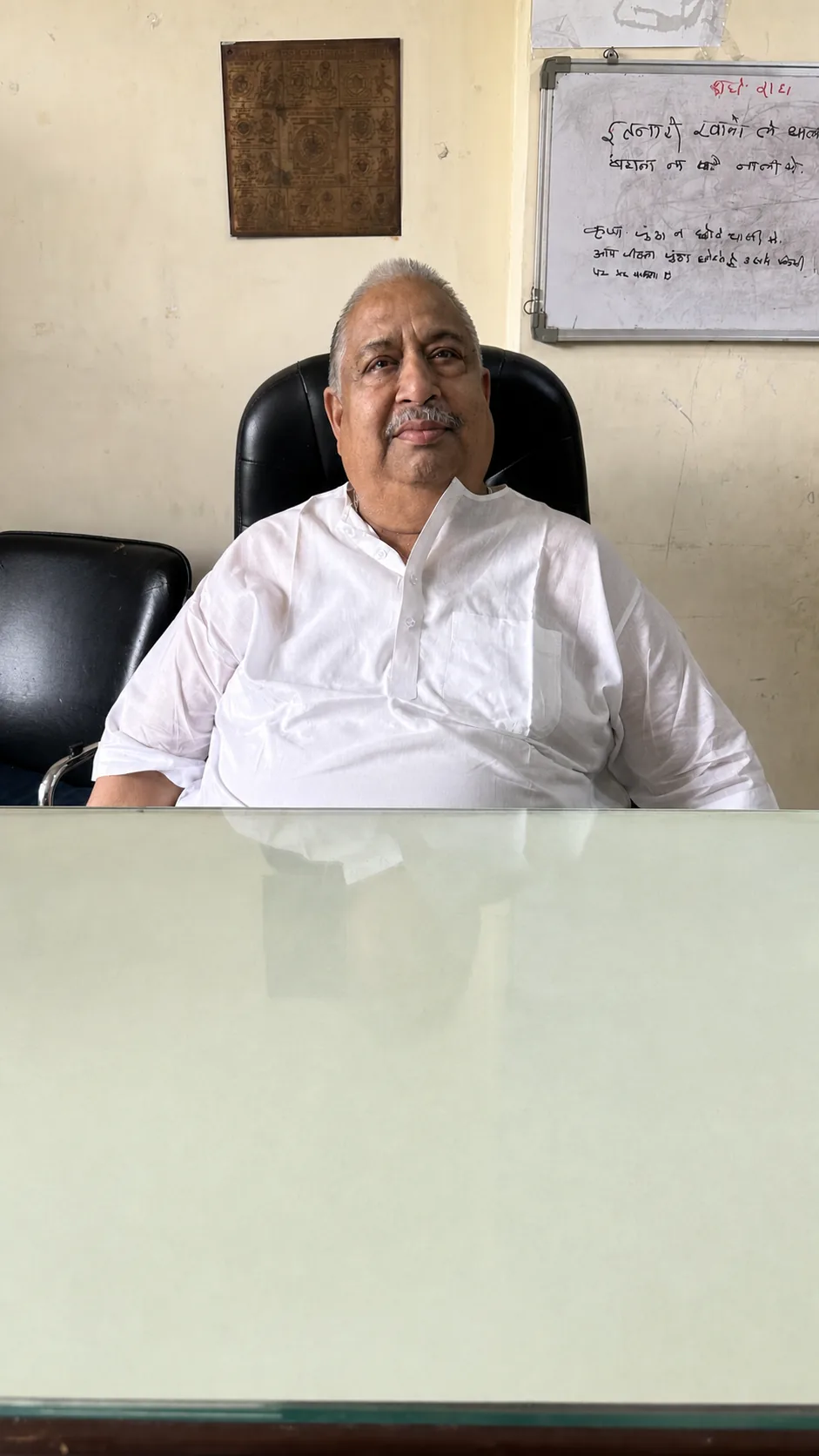 PJ PG caretaker seated at the front desk